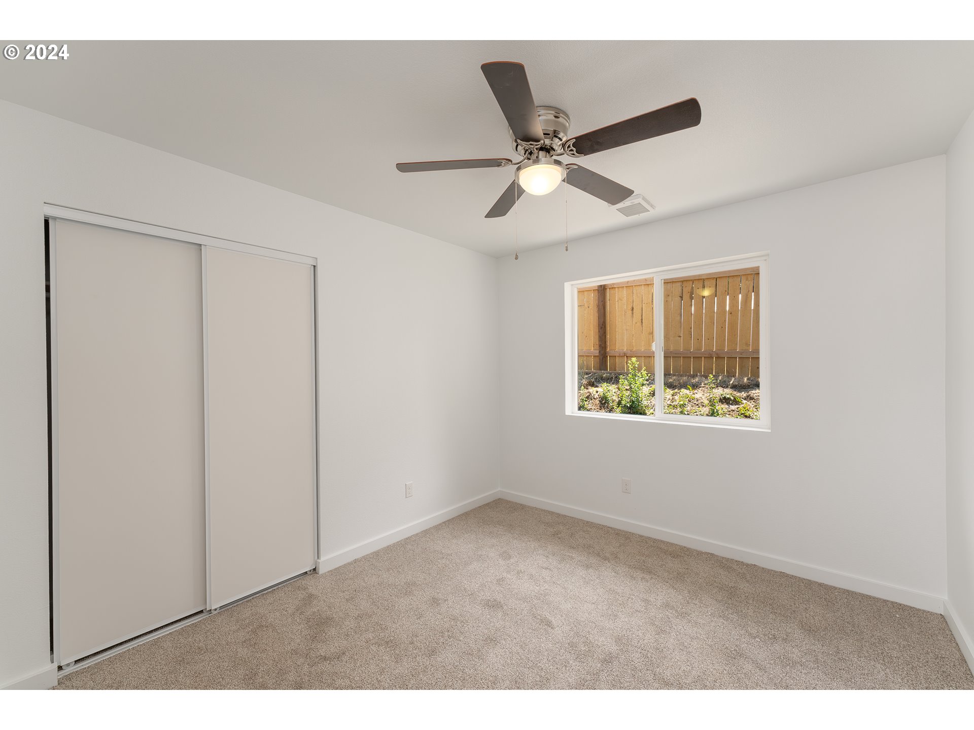 1237 Southeast Washington Avenue Roseburg, OR 97470 - Photo 17 of 28 a view of an empty room with a window
