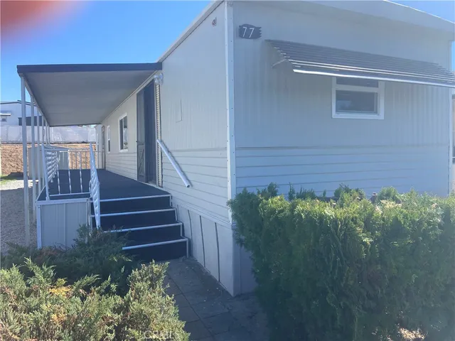 a house view with a backyard space
