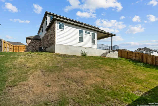 a house view with a garden space