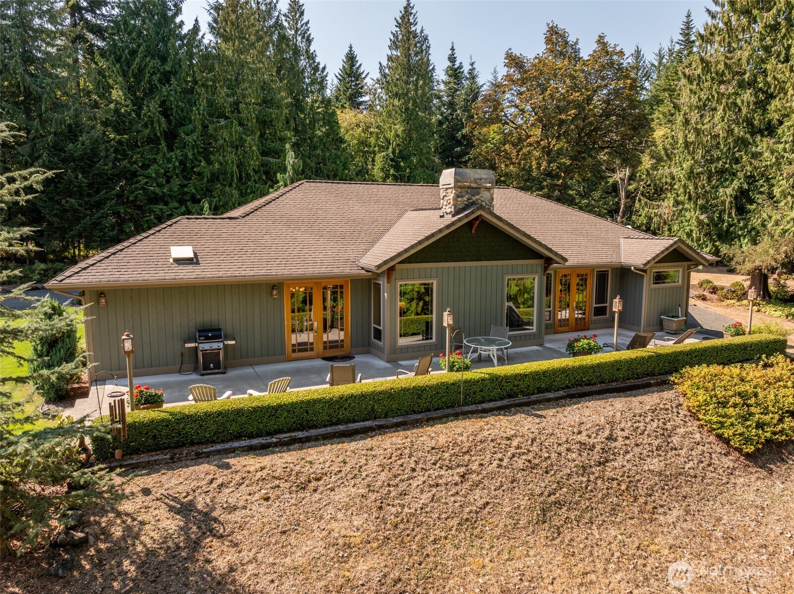 1065 Henry Boyd Road Port Angeles, WA 98362 - Photo 11 of 40 a front view of a house with garden