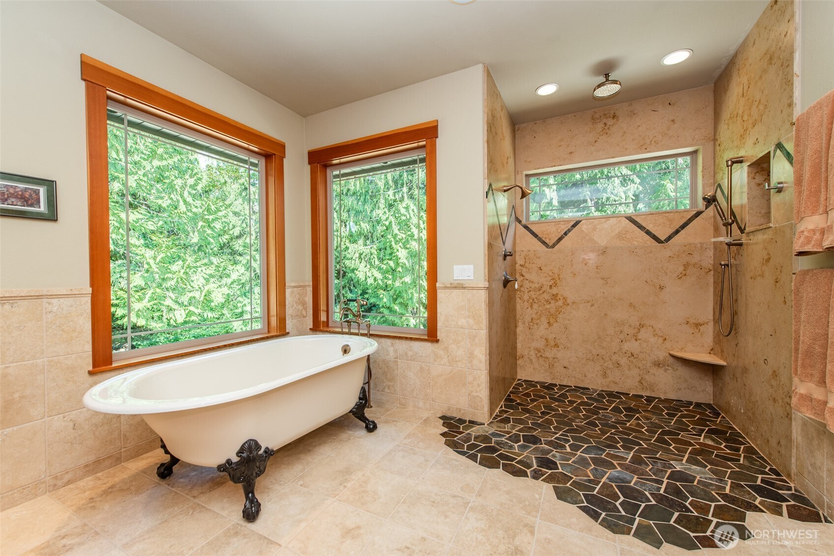 1065 Henry Boyd Road Port Angeles, WA 98362 - Photo 20 of 40 a bathroom with a bathtub and a shower