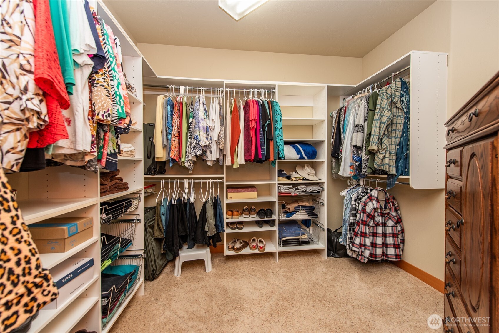 1065 Henry Boyd Road Port Angeles, WA 98362 - Photo 21 of 40 a view of walk in closet with clothes and shoes