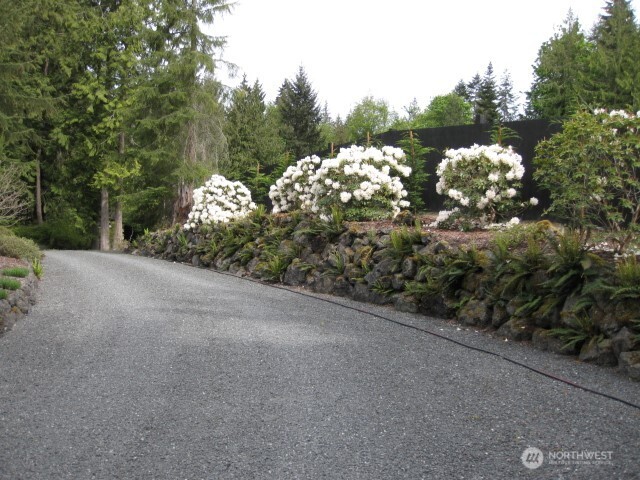 1065 Henry Boyd Road Port Angeles, WA 98362 - Photo 33 of 40 a view of a house with a tree