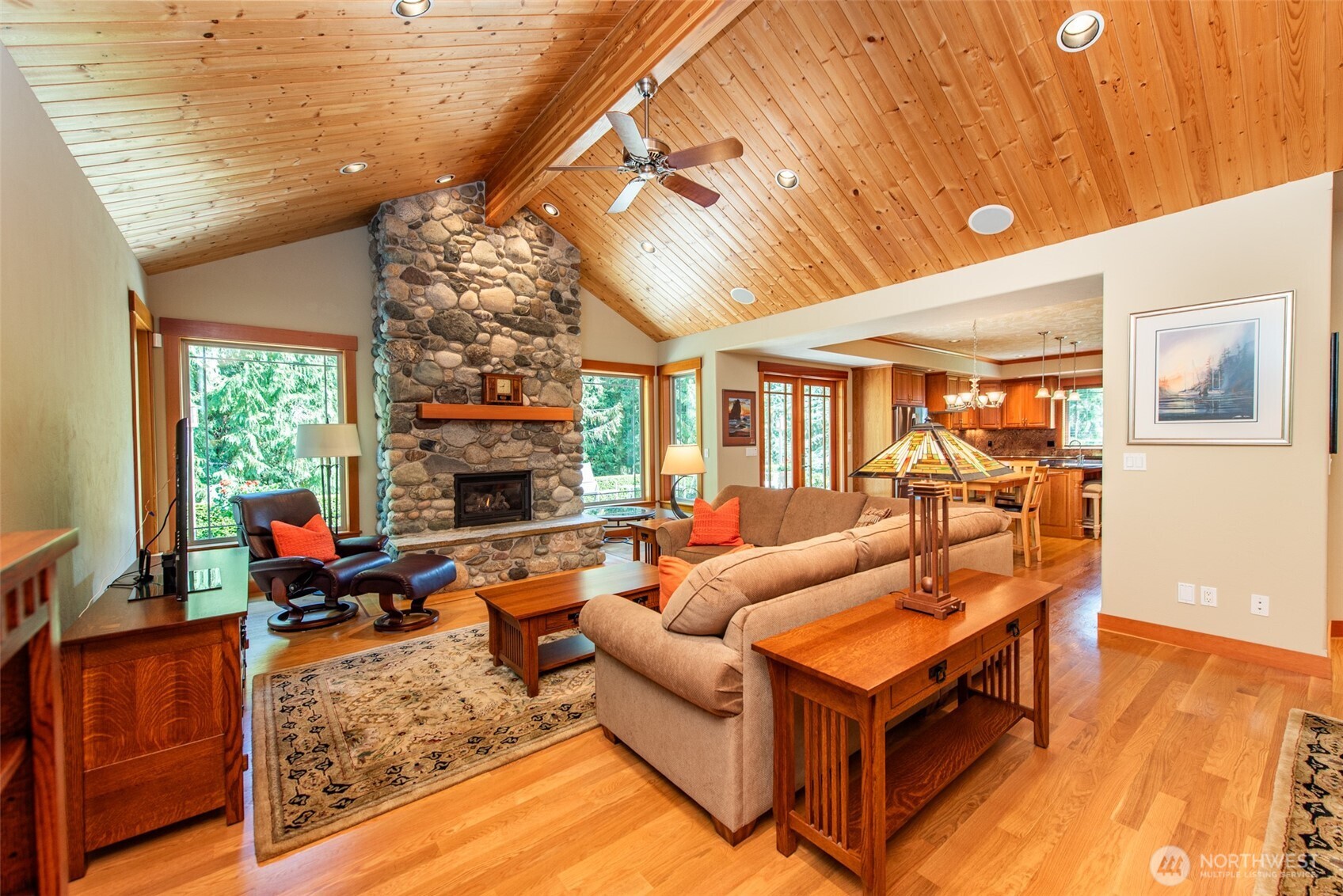 1065 Henry Boyd Road Port Angeles, WA 98362 - Photo 5 of 40 a living room with fireplace furniture and a large window