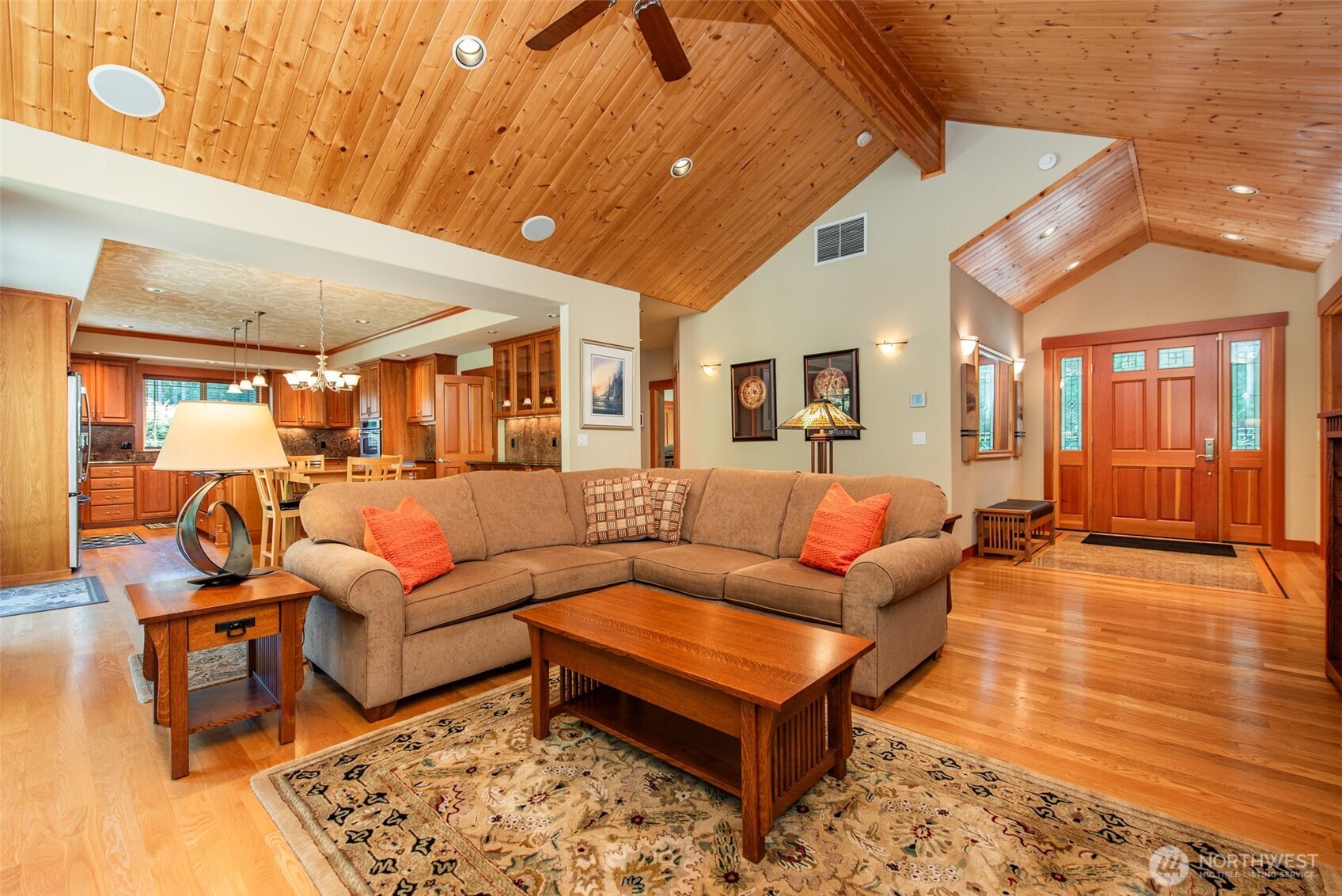 1065 Henry Boyd Road Port Angeles, WA 98362 - Photo 6 of 40 a living room with furniture a wooden floor and next to a window