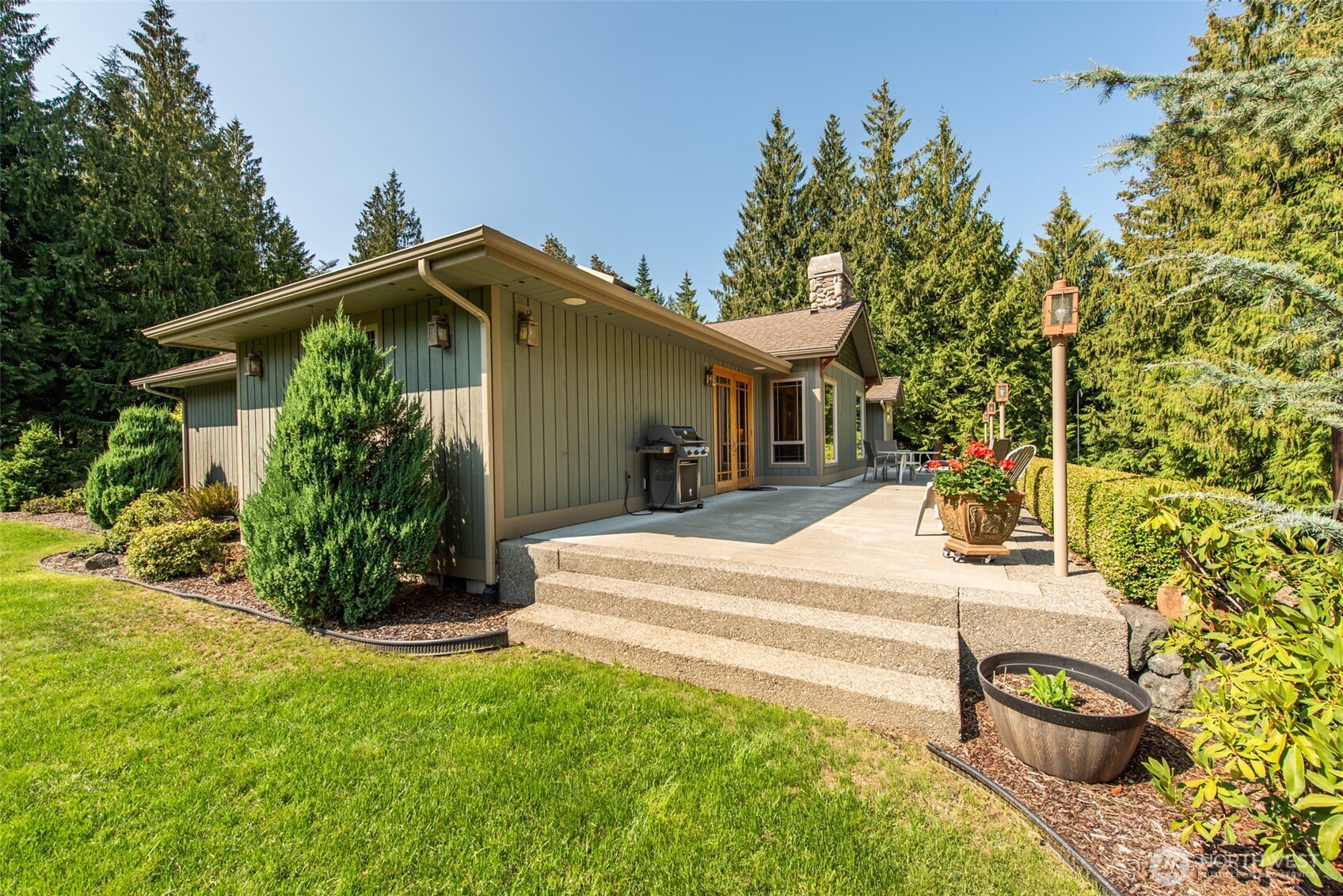 1065 Henry Boyd Road Port Angeles, WA 98362 - Photo 10 of 40 a front view of a house with garden