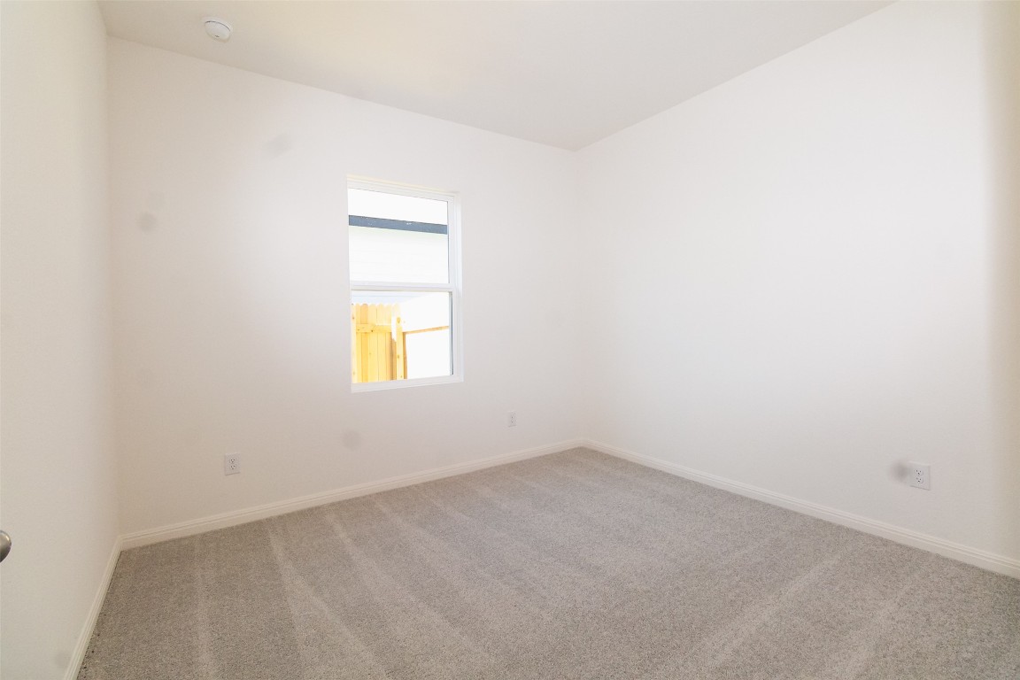 1524 Morris Loop San Marcos, TX 78666 - Photo 13 of 25 an empty room with a window