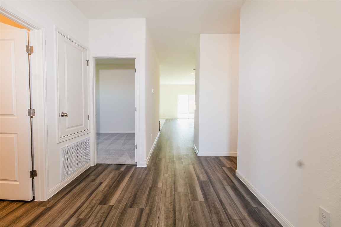 1524 Morris Loop San Marcos, TX 78666 - Photo 16 of 25 a view of a room with wooden floor