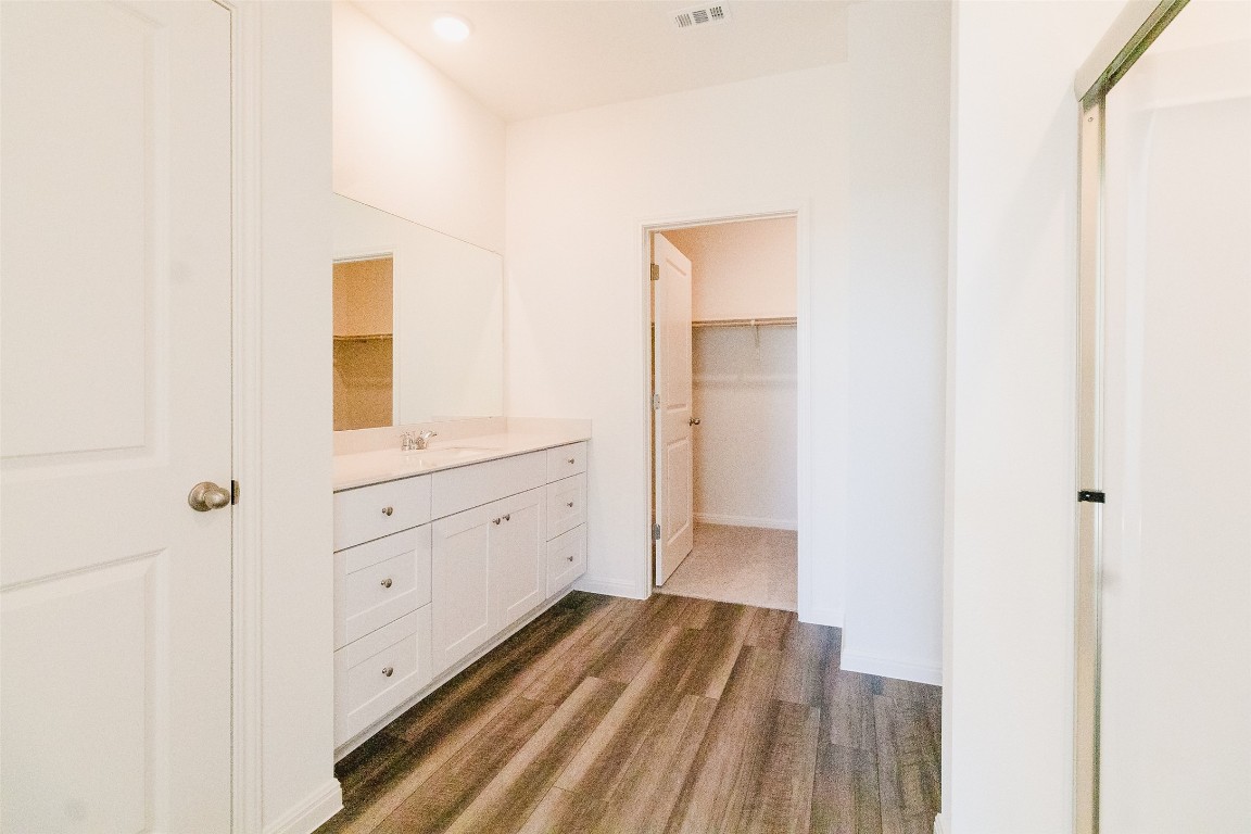 1524 Morris Loop San Marcos, TX 78666 - Photo 22 of 25 a room with a bed and a dresser in it