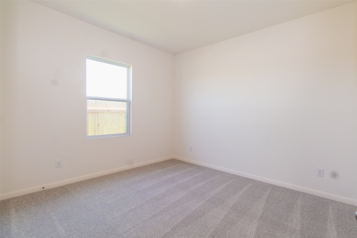 1524 Morris Loop San Marcos, TX 78666 - Photo 9 of 25 an empty room with a window
