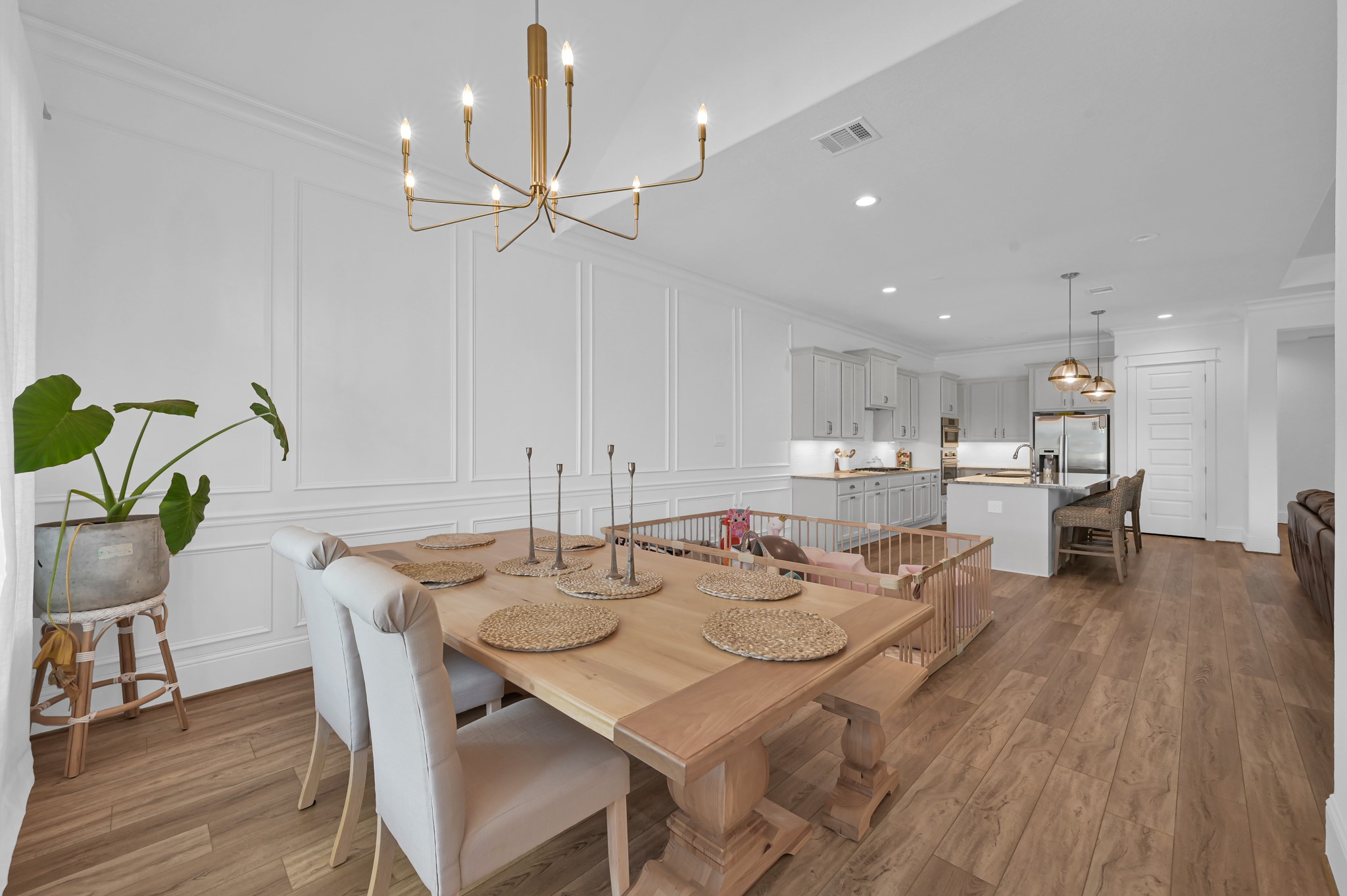 2333 Goldenglade Drive Conroe, TX 77384 - Photo 13 of 45 Open-concept dining area seamlessly connected to the kitchen and living space.