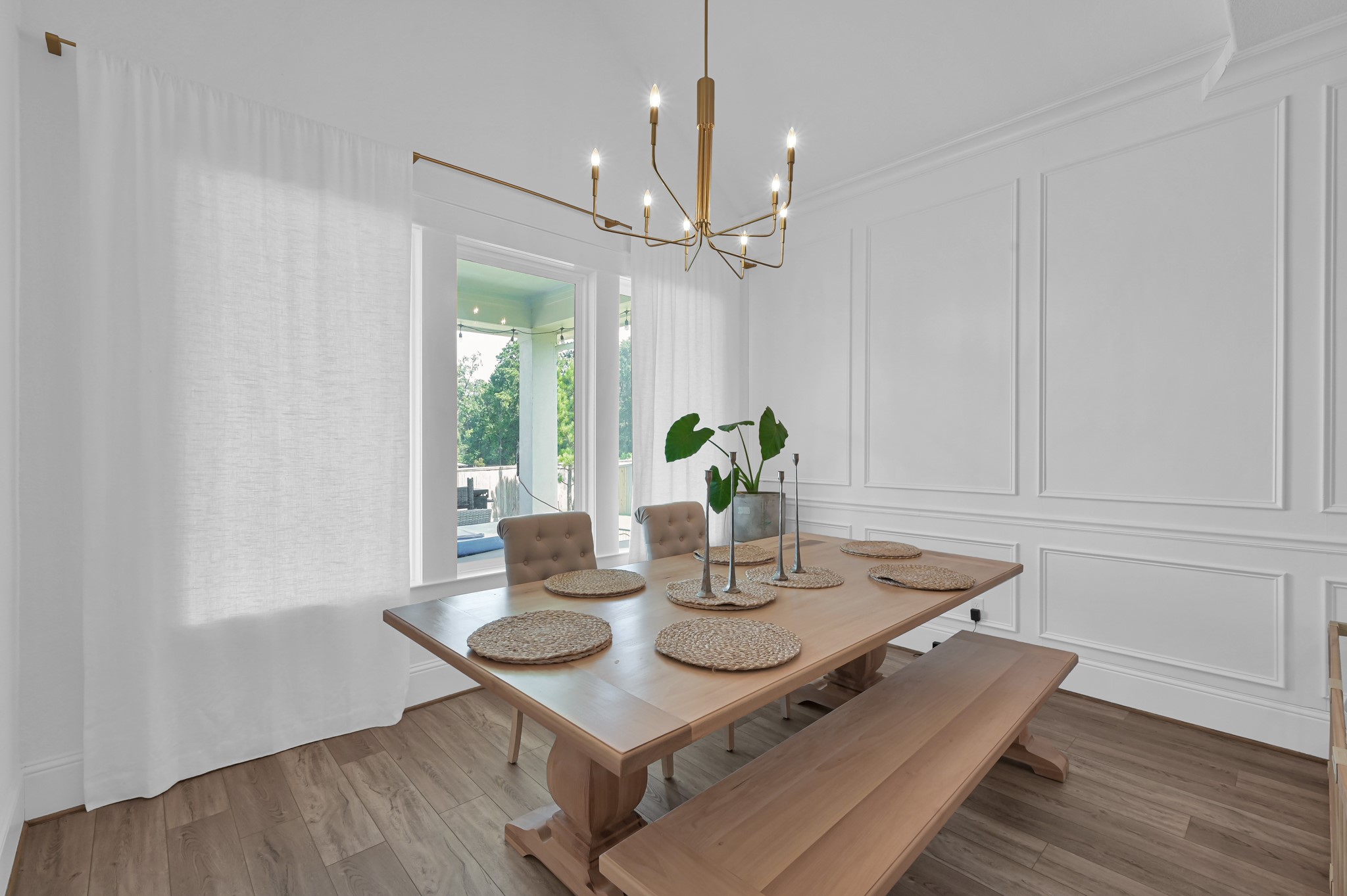 2333 Goldenglade Drive Conroe, TX 77384 - Photo 14 of 45 Notice the wall of windows open to the expansive covered back patio!