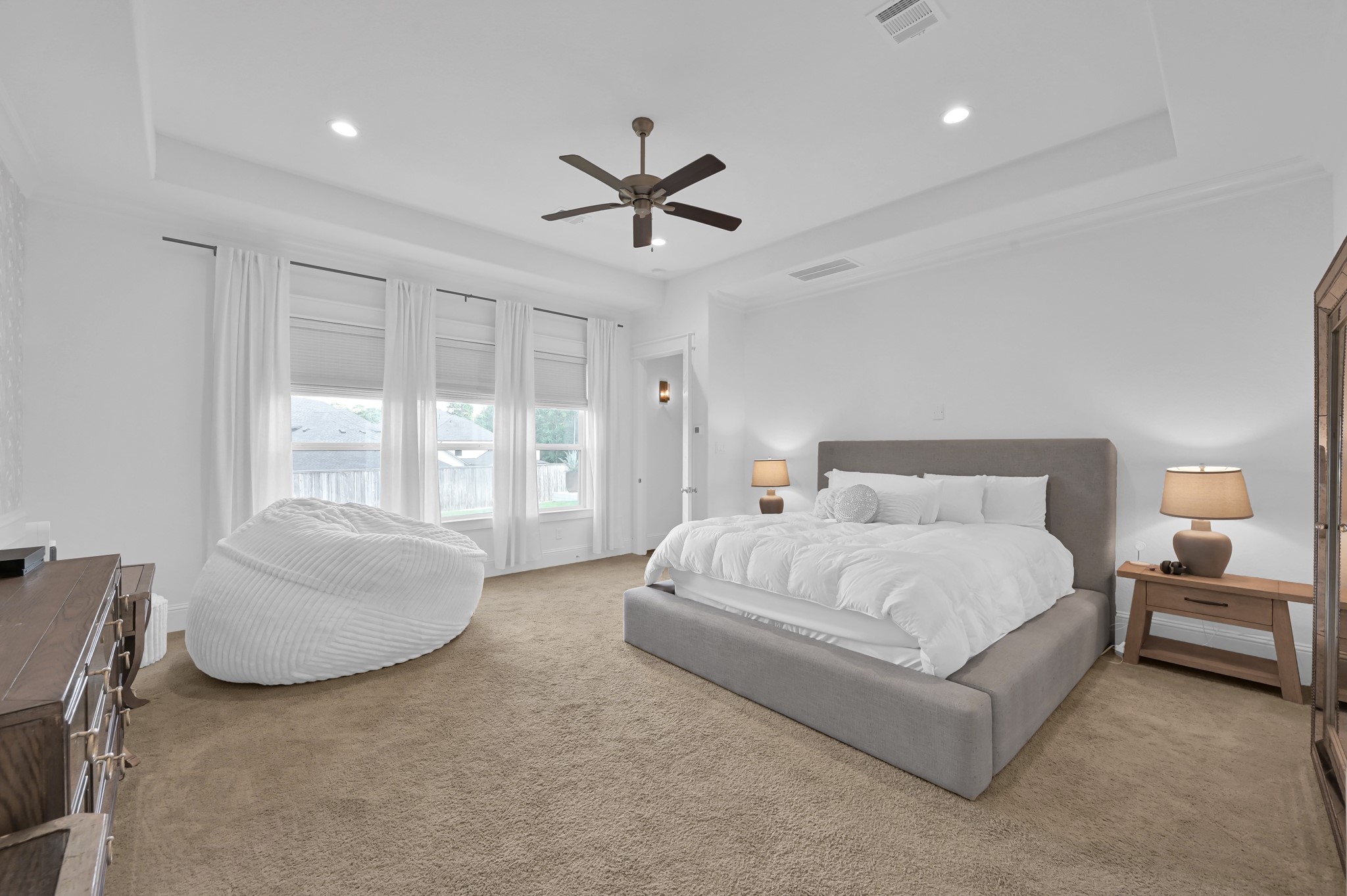 2333 Goldenglade Drive Conroe, TX 77384 - Photo 17 of 45 Another wall of windows bringing in ample natural light!