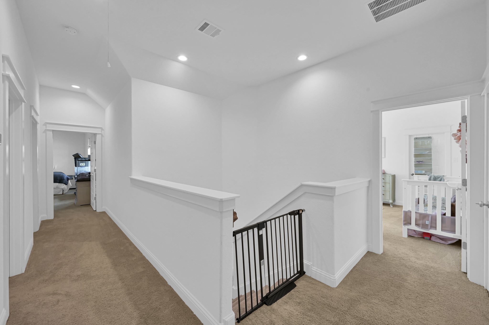 2333 Goldenglade Drive Conroe, TX 77384 - Photo 25 of 45 Landing zone at the top of the staircase. The Upstairs offers3 additional bedrooms + a gameroom!