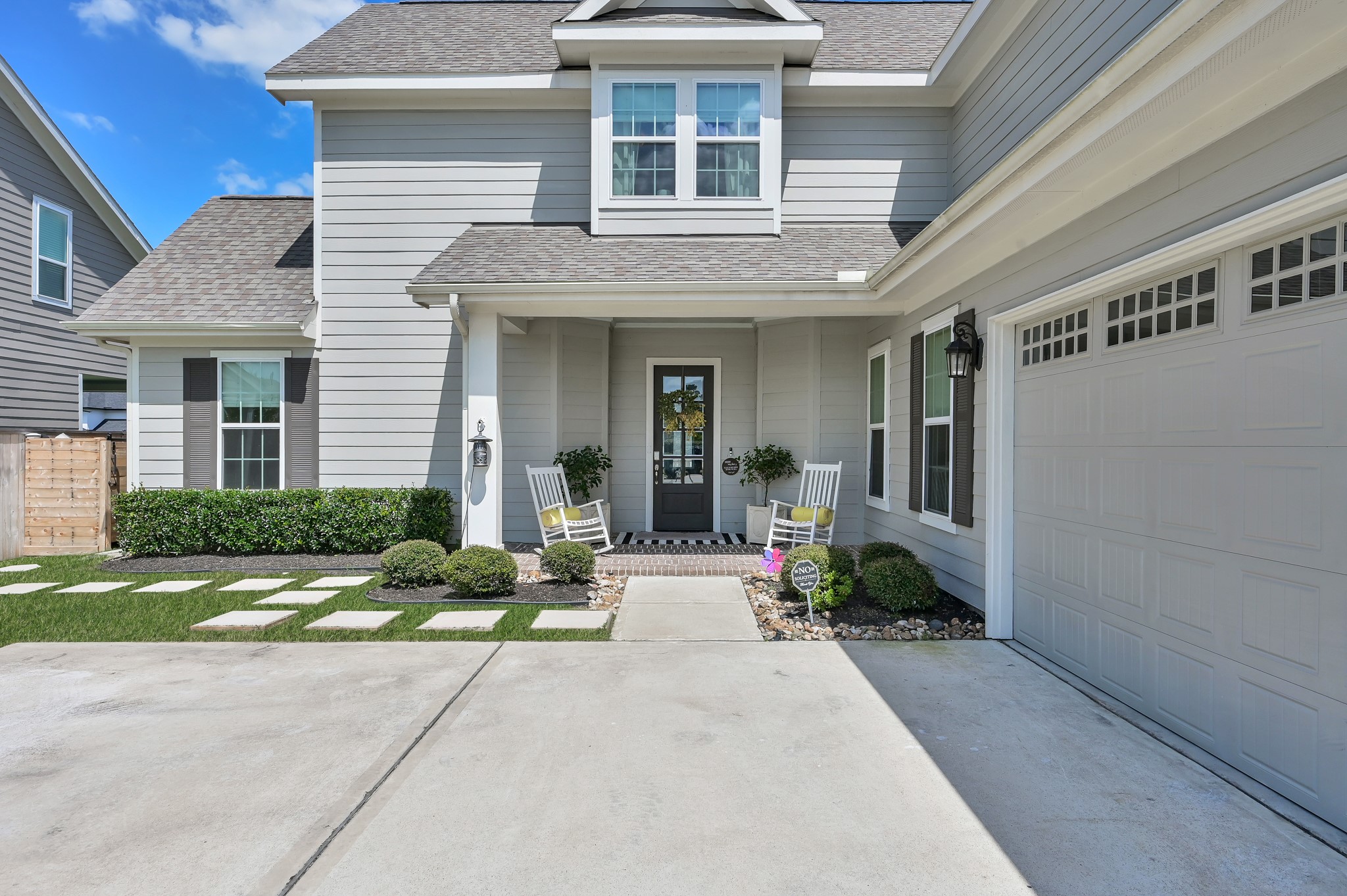2333 Goldenglade Drive Conroe, TX 77384 - Photo 3 of 45 Charming front porch entry with cozy seating and a welcoming vibe.