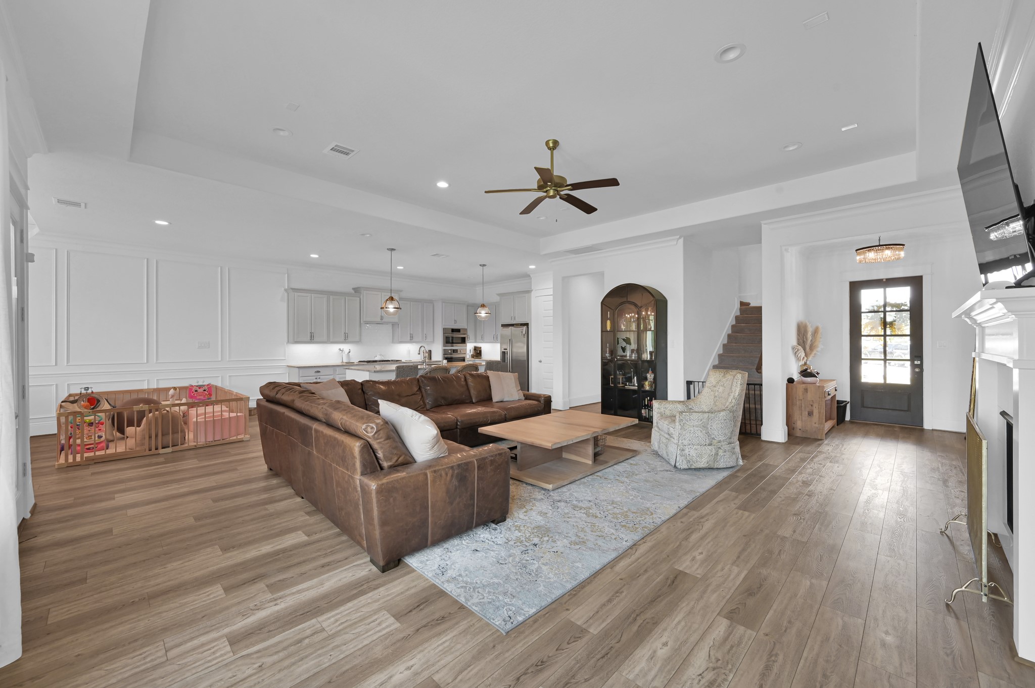 2333 Goldenglade Drive Conroe, TX 77384 - Photo 7 of 45 An entertainers delight with the open concept living/dining/kitchen space!