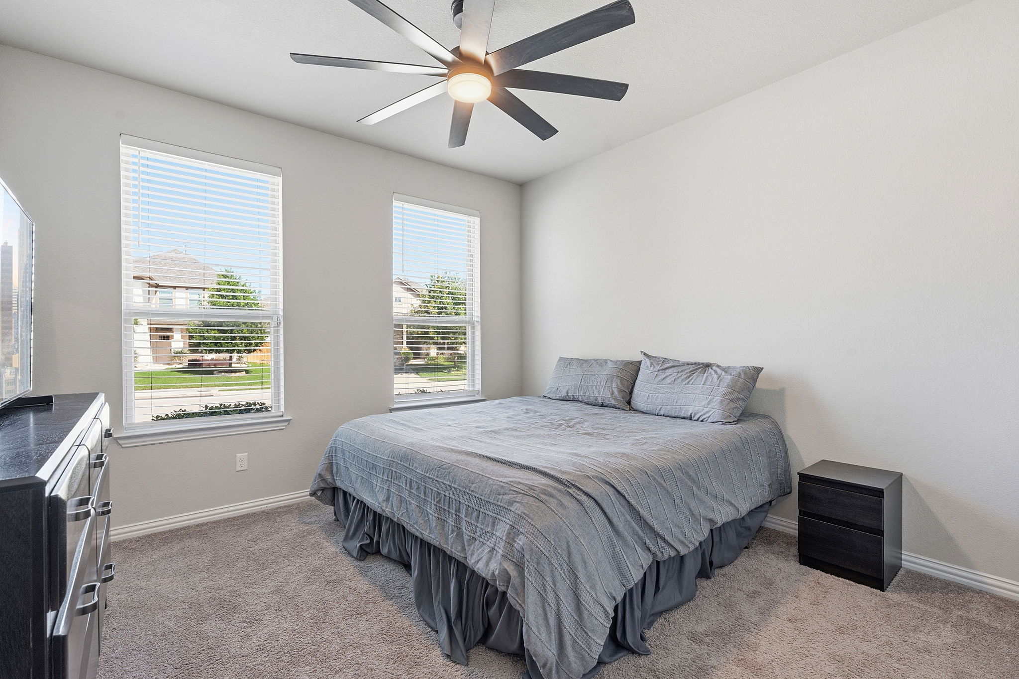 12616 Twisted Root Drive Manchaca, TX 78652 - Photo 22 of 36 One of three additional bedrooms, two of which come with modern ceiling fans.