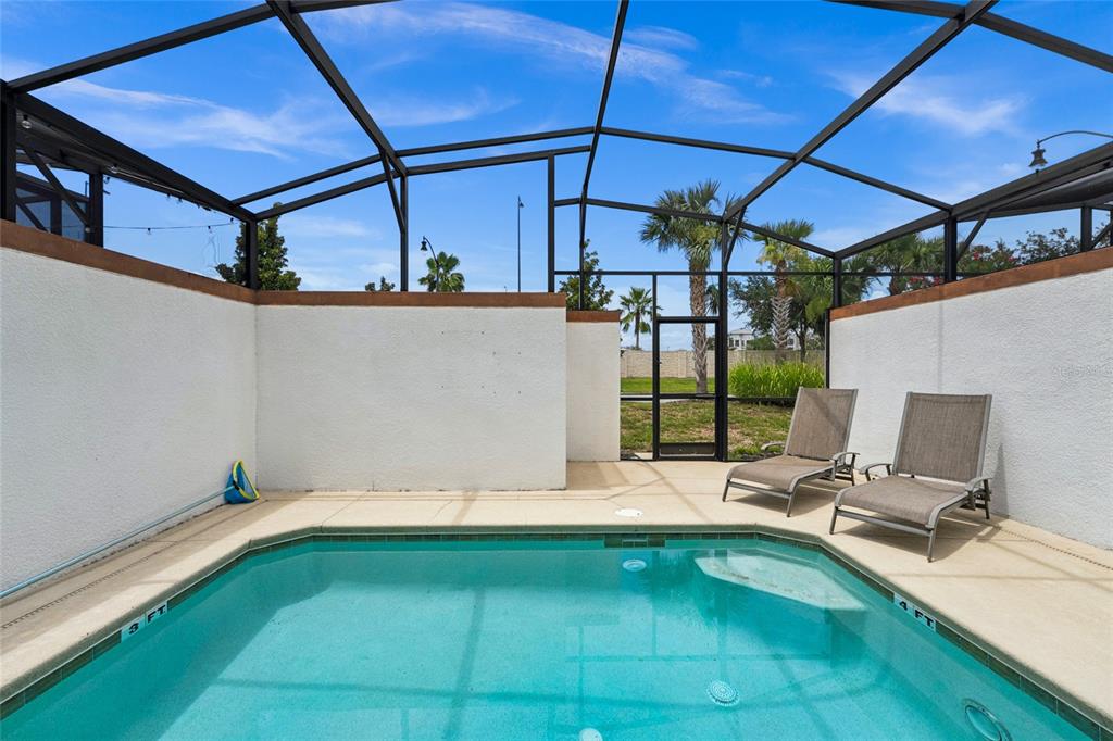 4841 Clock Tower Drive Kissimmee, FL 34746 - Photo 24 of 36 a room with pool table and glass door