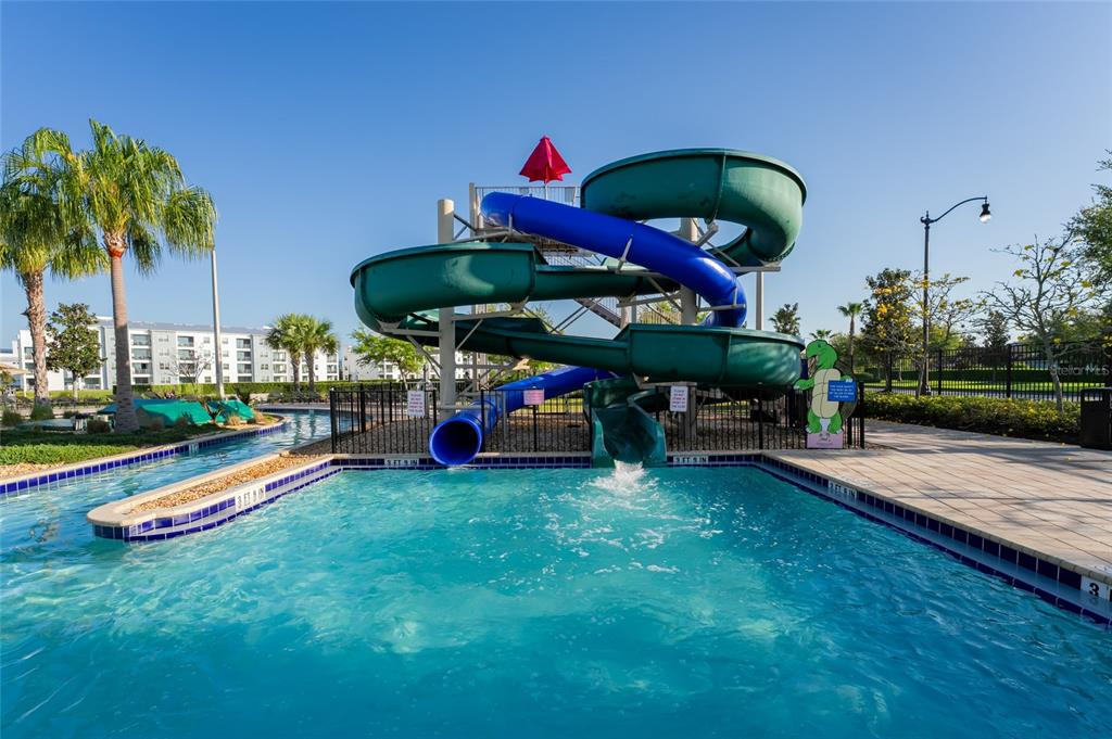4841 Clock Tower Drive Kissimmee, FL 34746 - Photo 35 of 36 a childrens park with lots of swings and slides
