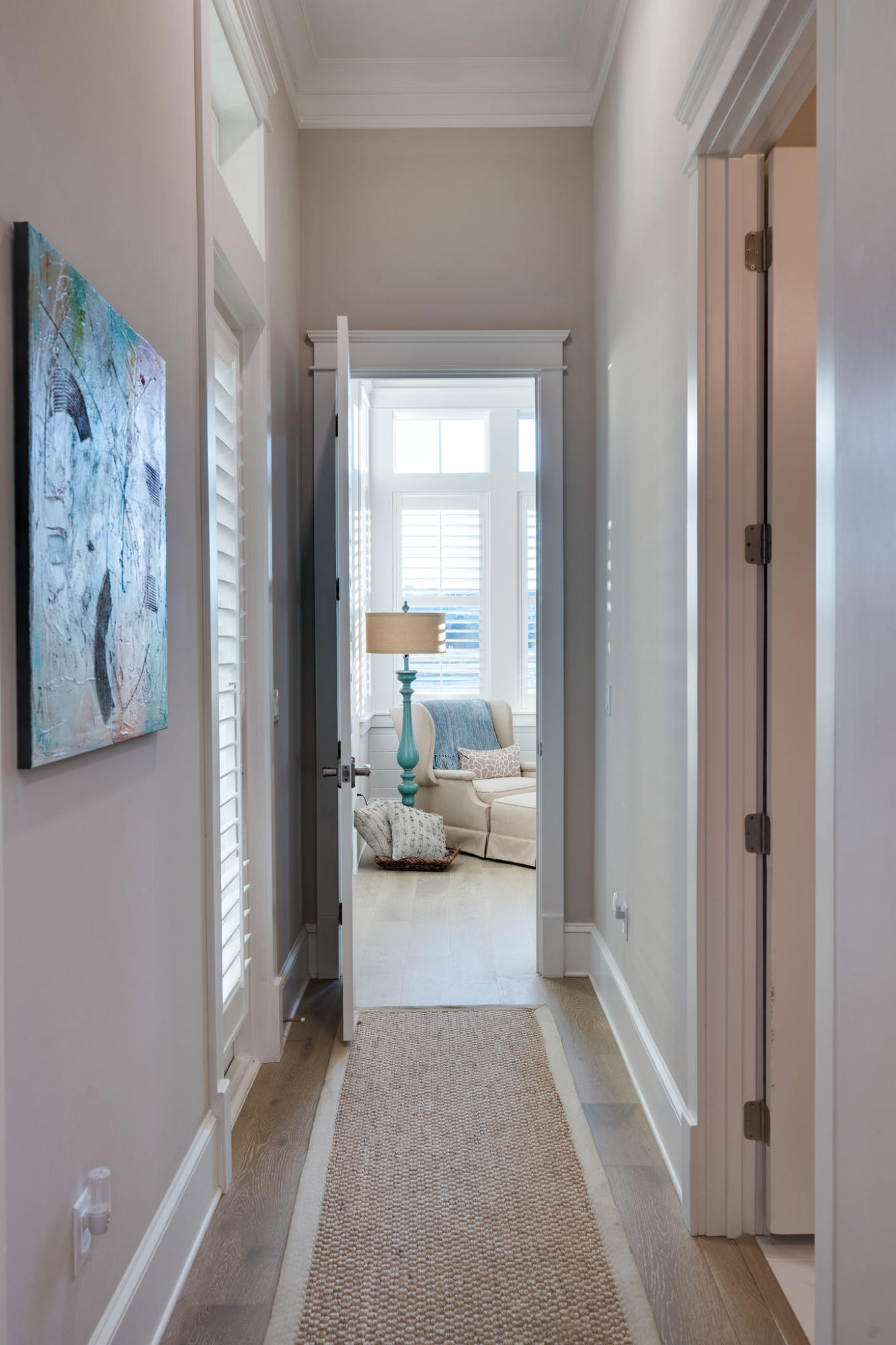 124 Clipper Street Inlet Beach, FL 32461 - Photo 14 of 47 a view of a hallway with a couches and dining area with a large window