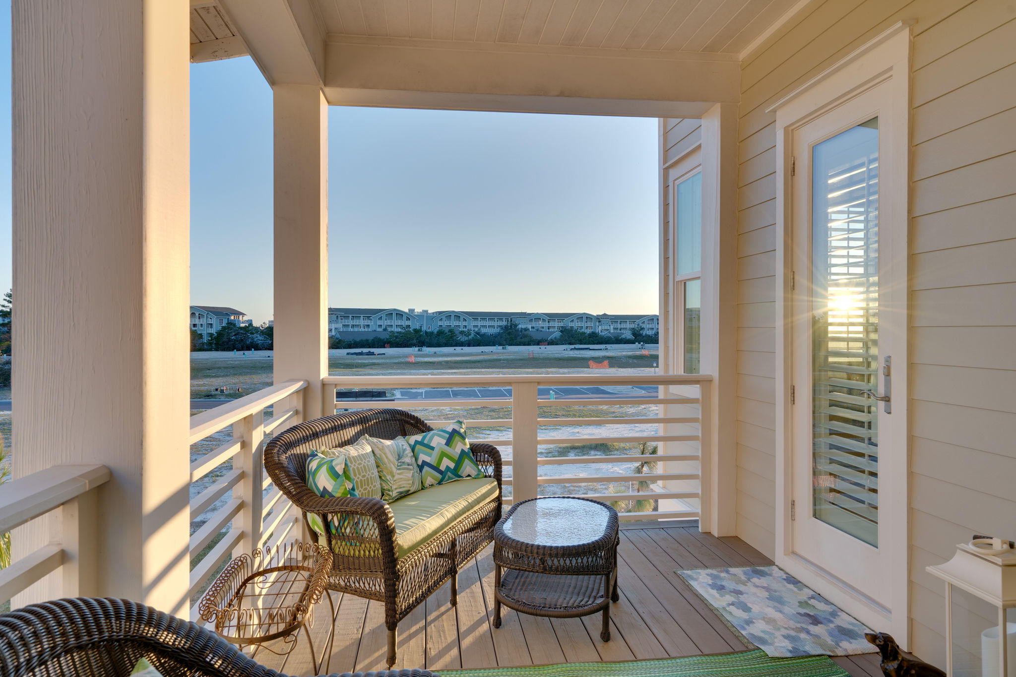 124 Clipper Street Inlet Beach, FL 32461 - Photo 33 of 47 a balcony with furniture and wooden floor