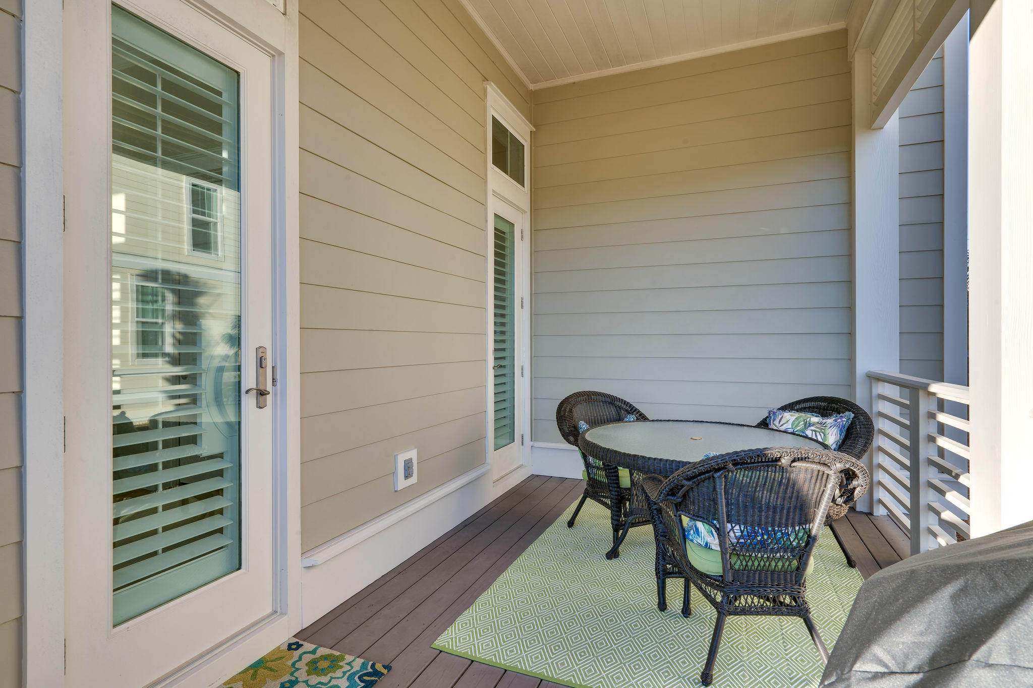124 Clipper Street Inlet Beach, FL 32461 - Photo 45 of 47 a porch with a bench and a rug
