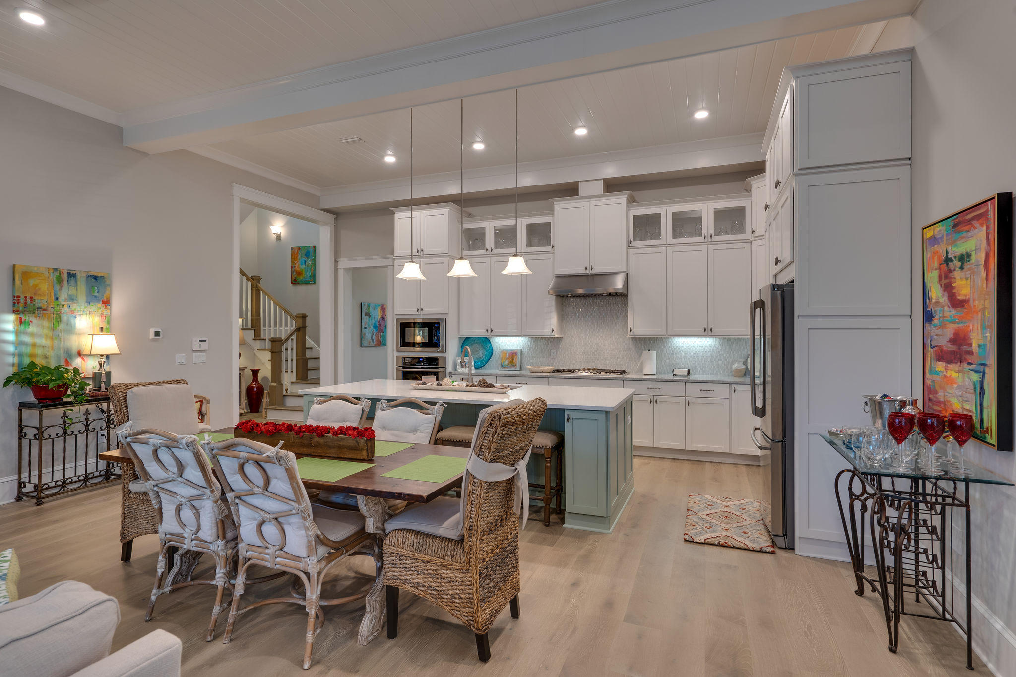 124 Clipper Street Inlet Beach, FL 32461 - Photo 9 of 47 a open dining room with stainless steel appliances kitchen island granite countertop a dining table chairs and view kitchen