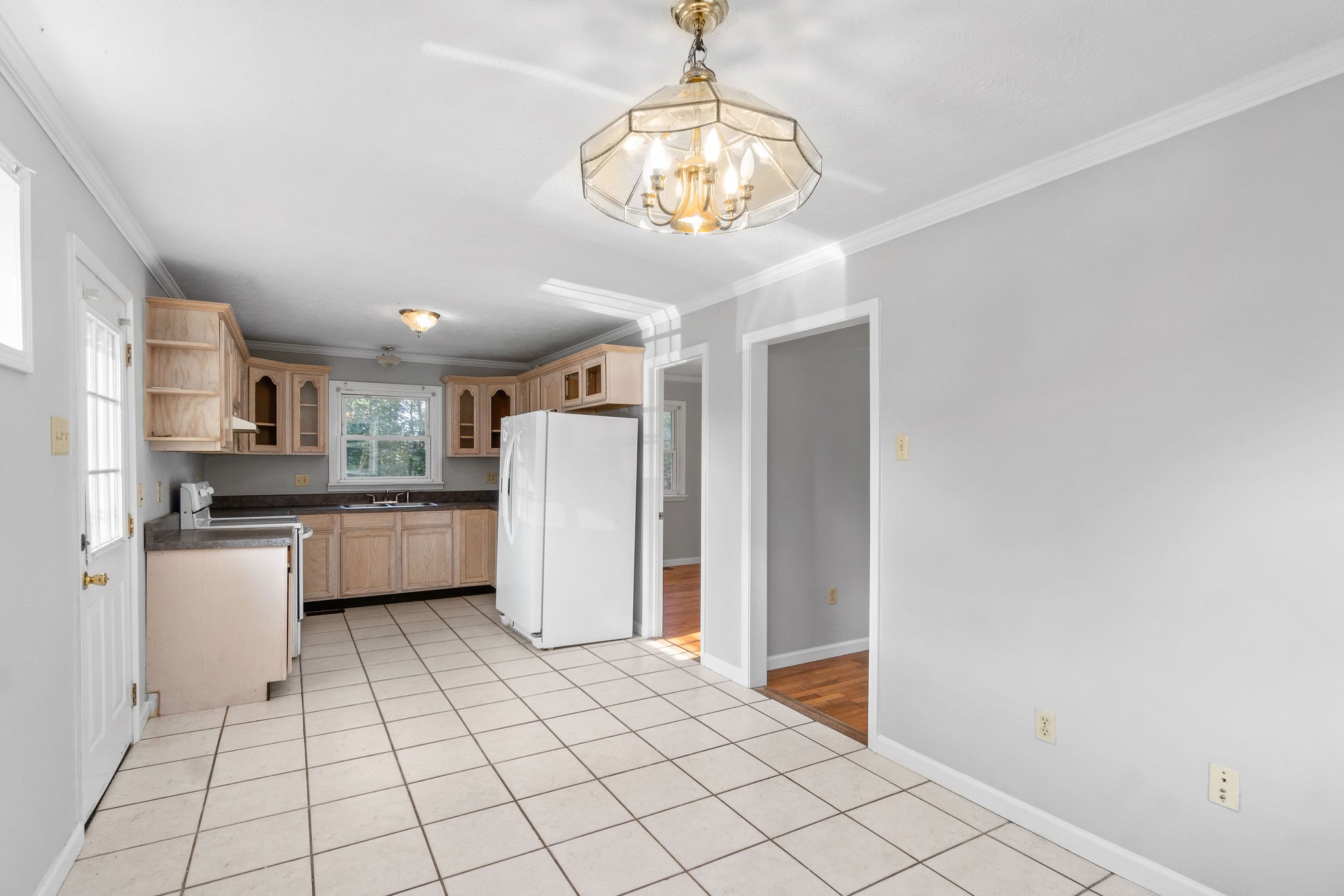 65 Locust Road Erin, TN 37061 - Photo 8 of 13 a kitchen with stainless steel appliances a refrigerator sink and cabinets