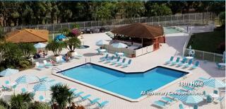 a view of swimming pool with a patio