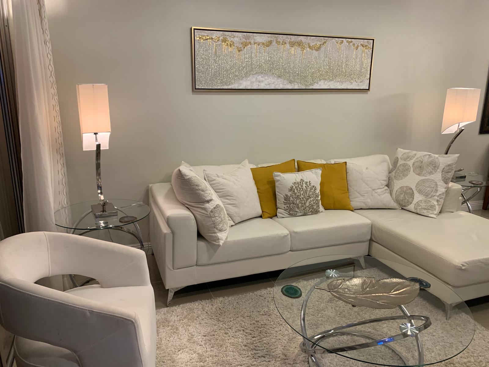 3940 Inverrary Boulevard, Unit 302A Lauderhill, FL 33319 - Photo 17 of 33 a living room with furniture and a couch