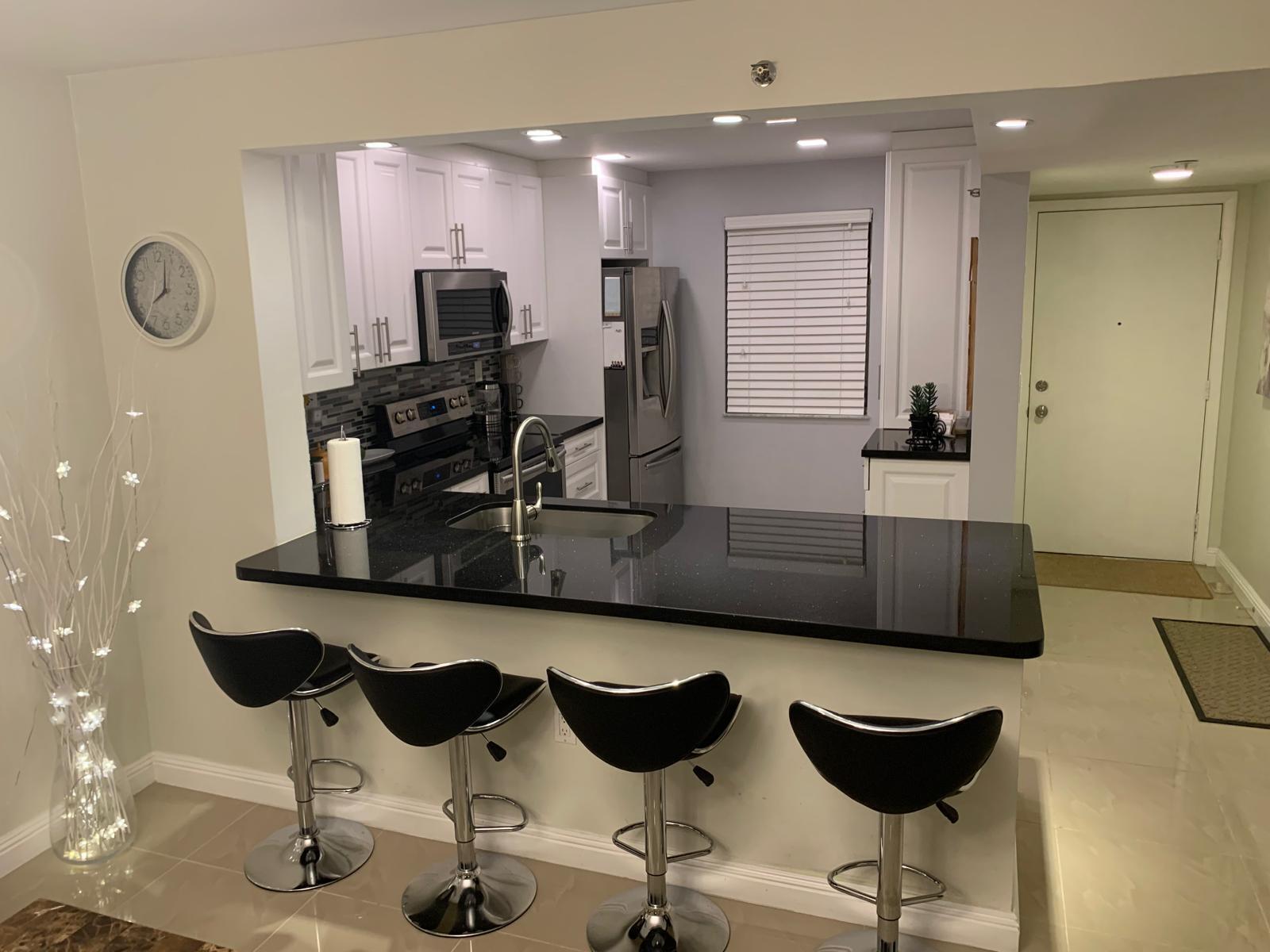 3940 Inverrary Boulevard, Unit 302A Lauderhill, FL 33319 - Photo 18 of 33 a living room with furniture