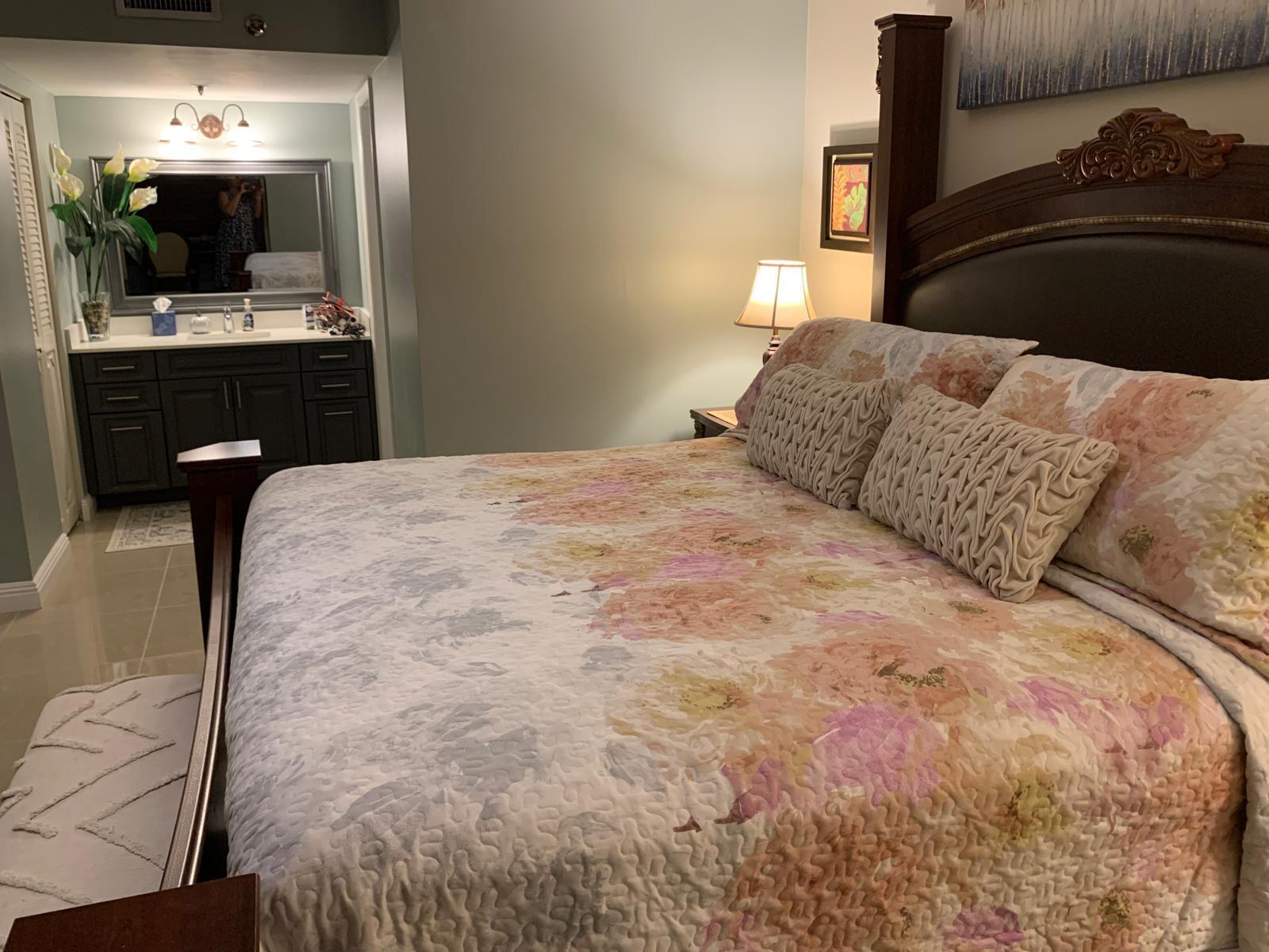 3940 Inverrary Boulevard, Unit 302A Lauderhill, FL 33319 - Photo 2 of 33 a bedroom with a bed and a television