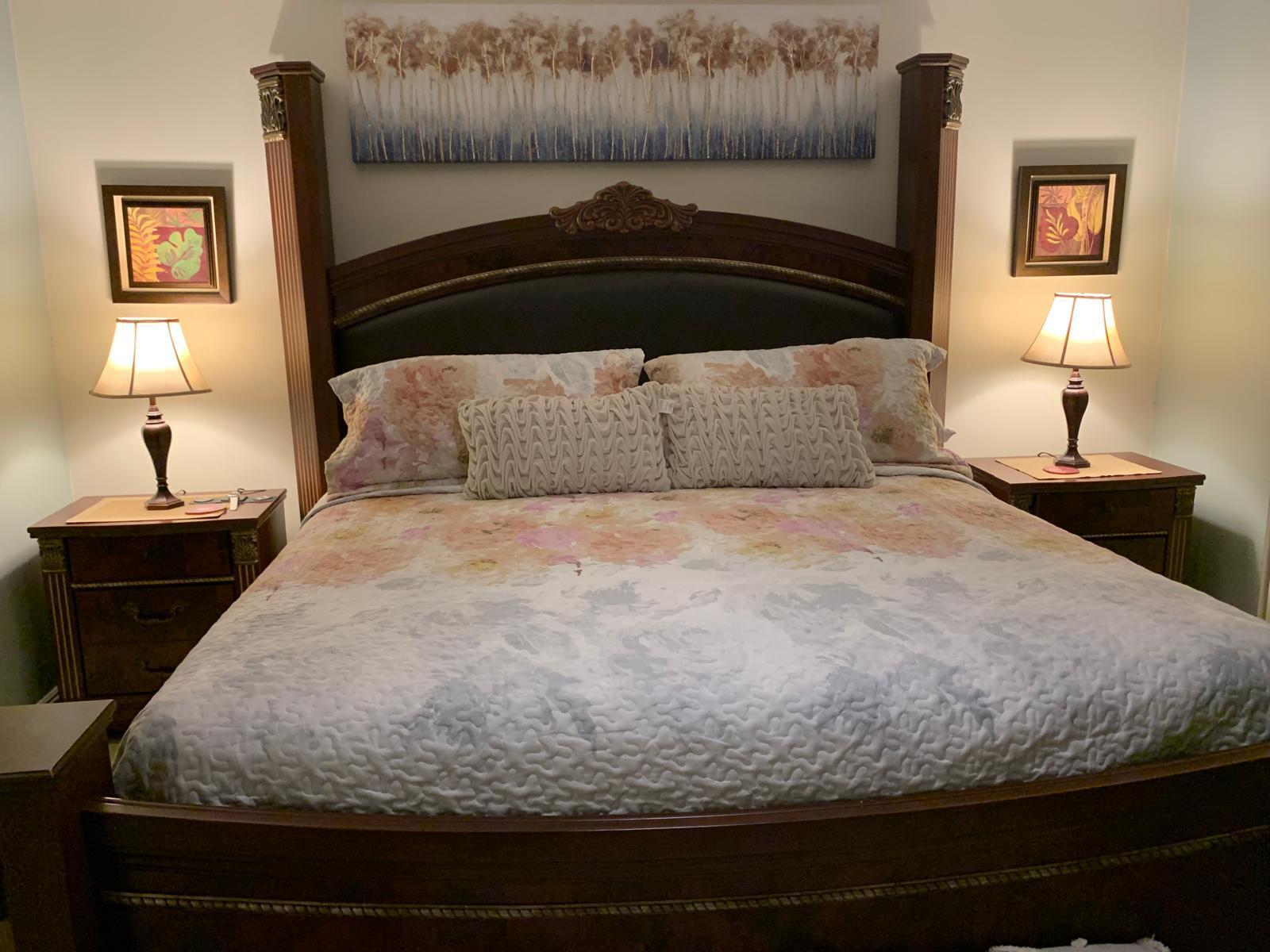 3940 Inverrary Boulevard, Unit 302A Lauderhill, FL 33319 - Photo 23 of 33 a bedroom with a bed and a night stand