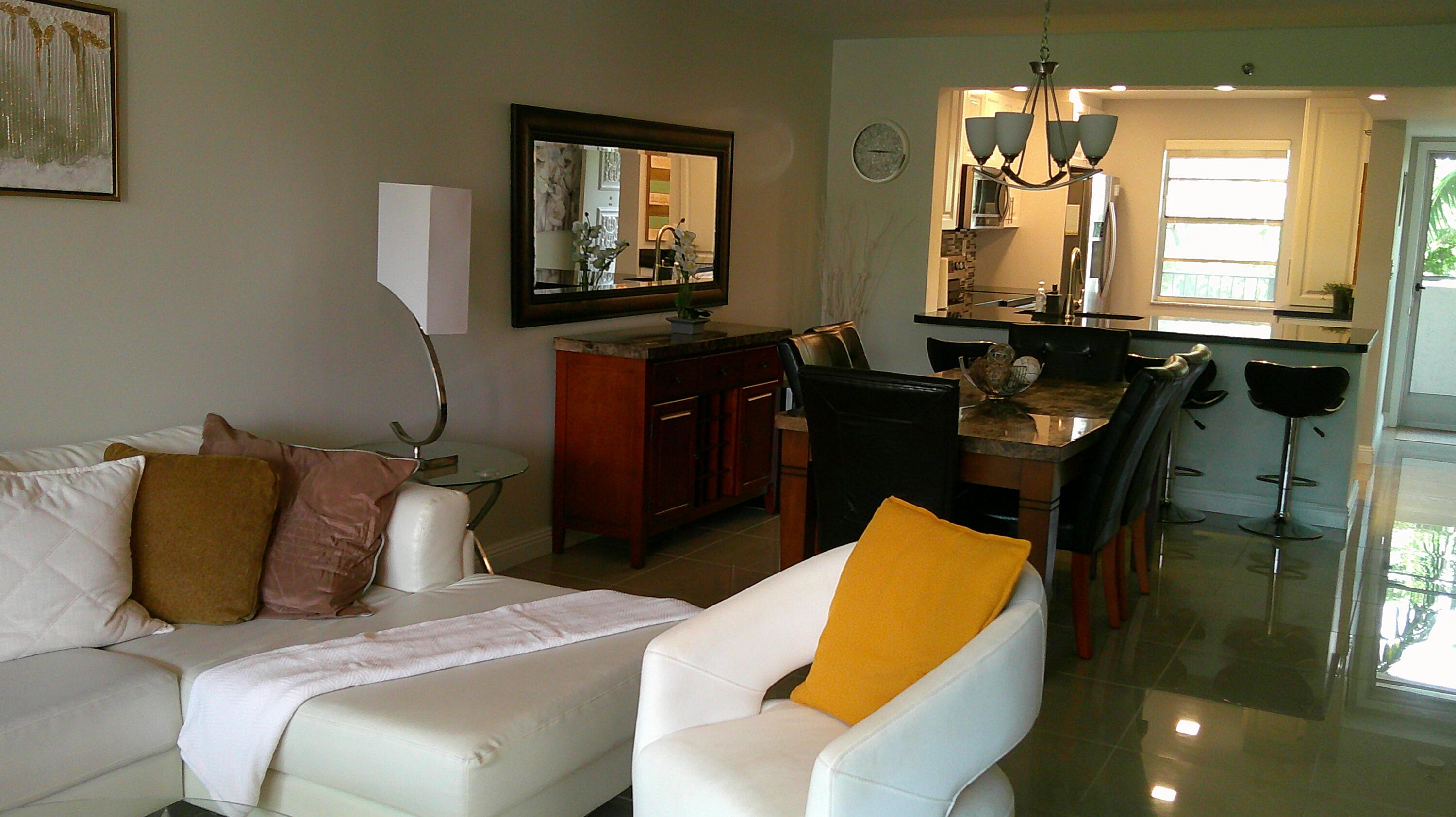 3940 Inverrary Boulevard, Unit 302A Lauderhill, FL 33319 - Photo 4 of 33 a bedroom with bed and window