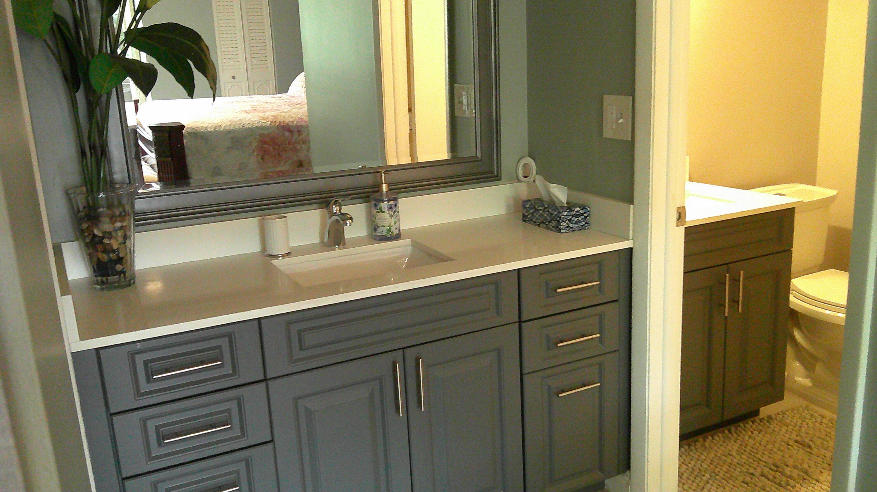 3940 Inverrary Boulevard, Unit 302A Lauderhill, FL 33319 - Photo 9 of 33 a bathroom with a sink and a mirror