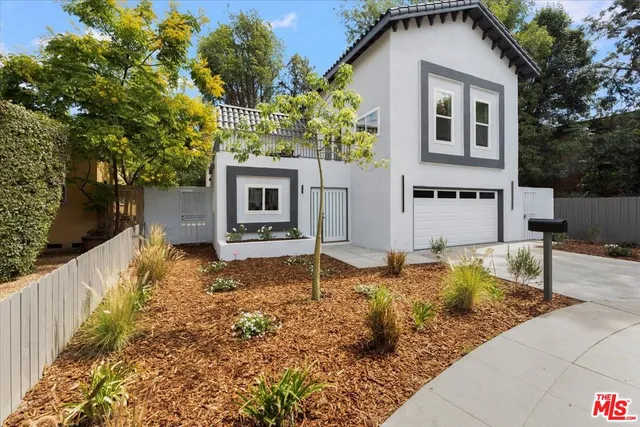 a house view with a outdoor space
