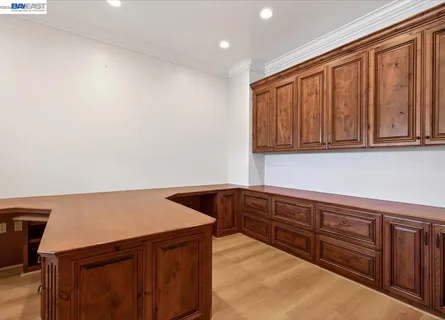 a utility room with sink dryer and washer
