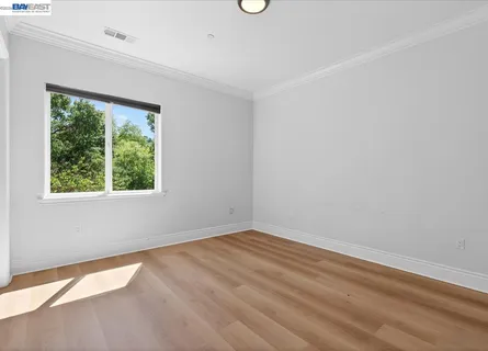 a bathroom with a sink a mirror and a shower