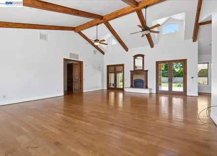 a living room with furniture fireplace and flat screen tv
