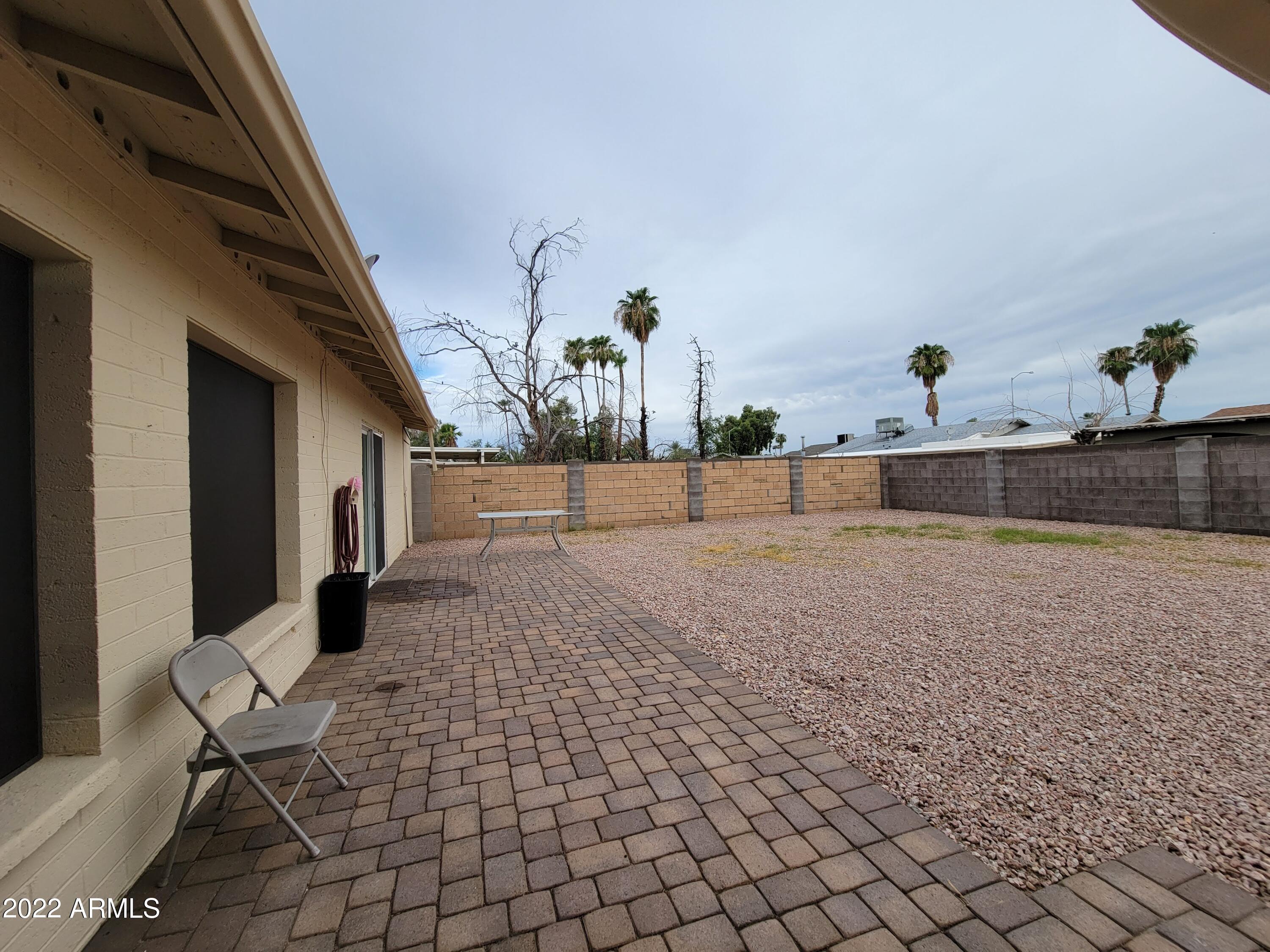2042 West Decatur Street Mesa, AZ 85201 - Photo 38 of 38 a living room with furniture