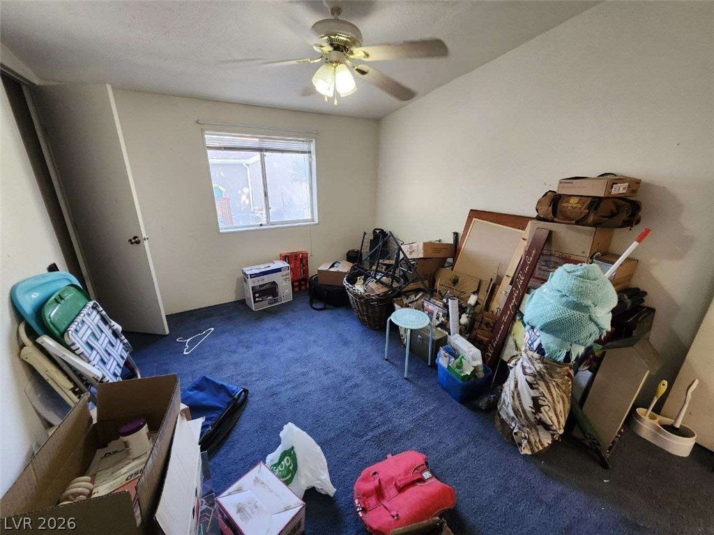 942 Holt Caliente, NV 89008 - Photo 15 of 22 A well-lit bedroom provides a versatile space for personal needs.