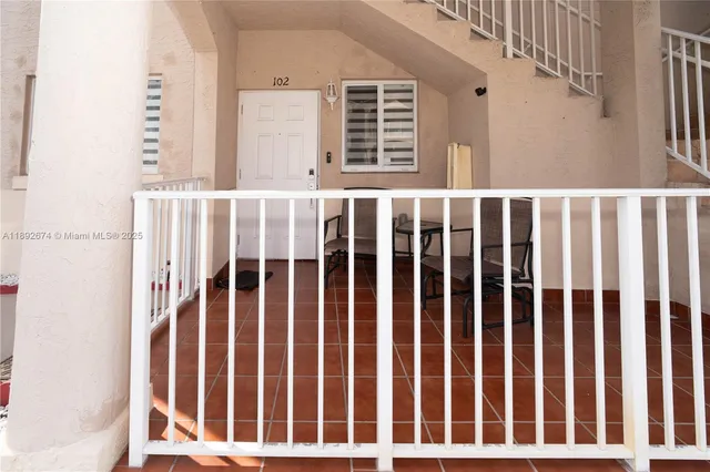 a black and white photo of a door