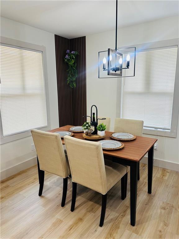 2793 Gresham Rd S East Atlanta, GA 30316 - Photo 14 of 48 a view of a dining room with a table and chairs