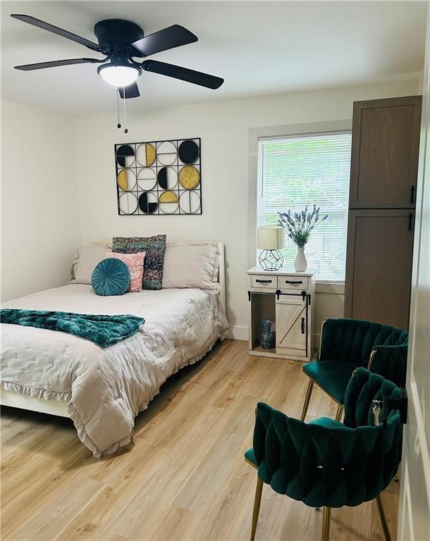 2793 Gresham Rd S East Atlanta, GA 30316 - Photo 20 of 48 a bedroom with a bed window and couch