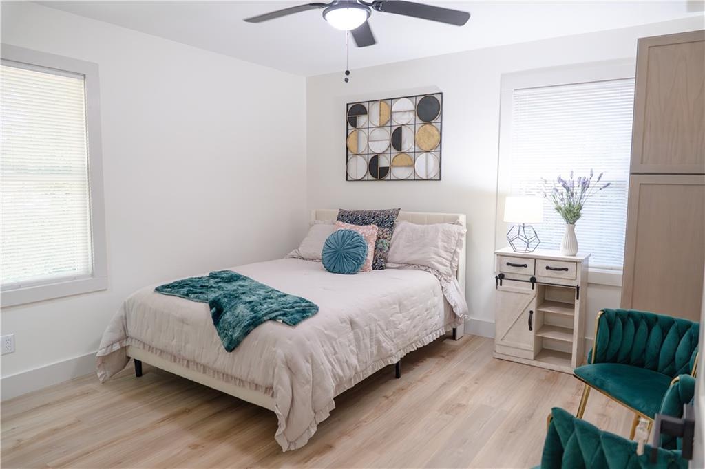 2793 Gresham Rd S East Atlanta, GA 30316 - Photo 29 of 48 a bedroom with a bed and a couch