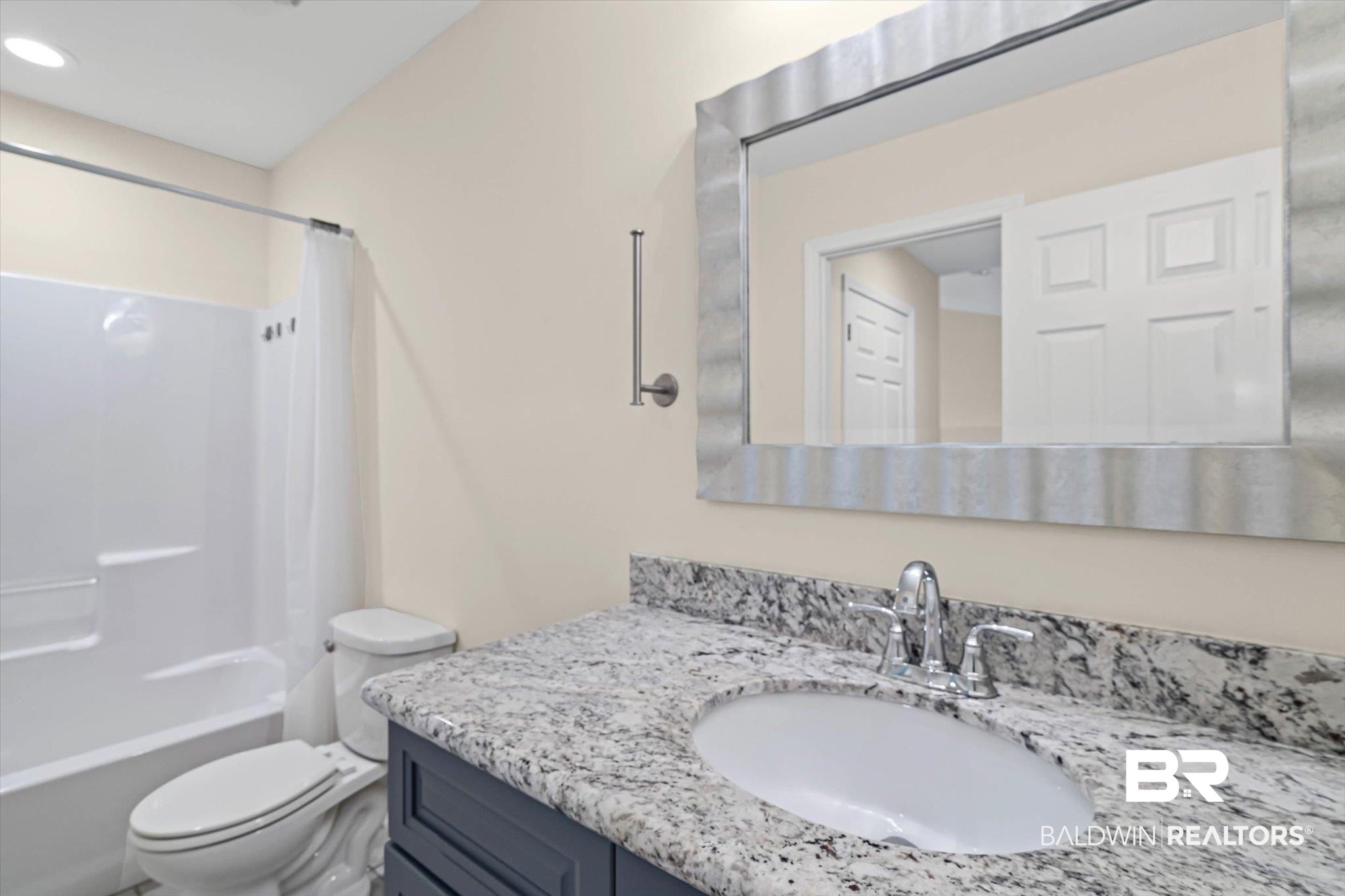 919 Sailor Circle Foley, AL 36535 - Photo 17 of 24 Bathroom with vanity and shower / tub combo with curtain