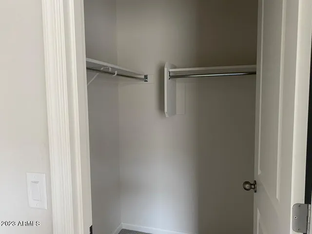 a empty closet with white paint