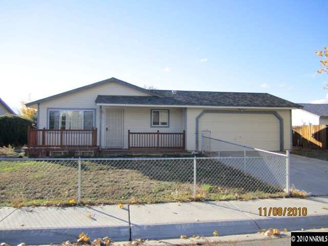 111 Empire Road Dayton, NV 89403 - Photo 1 of 13 a front view of a house