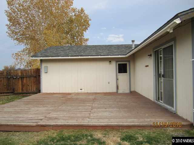 111 Empire Road Dayton, NV 89403 - Photo 12 of 13 a view of a house with a yard