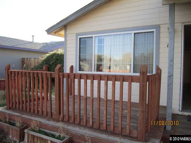 111 Empire Road Dayton, NV 89403 - Photo 2 of 13 a view of a wooden fence
